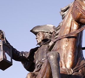 Paul Revere on a galloping horse statue. 