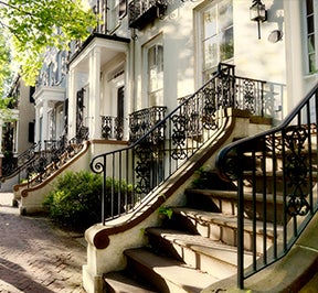 Row homes lining a picturesque street in Savannah.