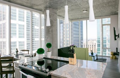 The gorgeous kitchen overlooks the living room and floor to ceiling windows at 505. 