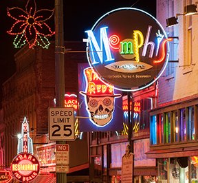 Beale street neons lit up at night.