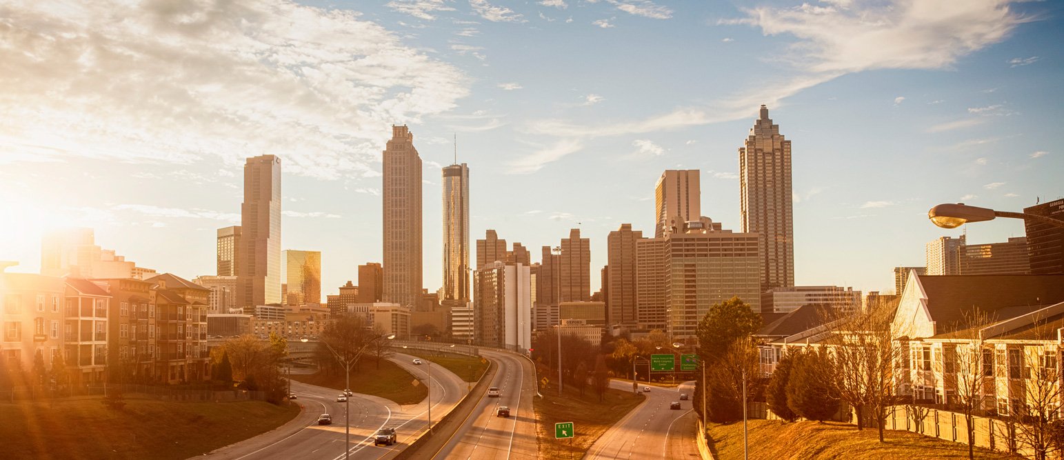 Golden sunset over Atlanta cityscape. 