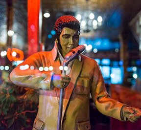 Elvis Presley, The King. statue inside a Memphis bar.